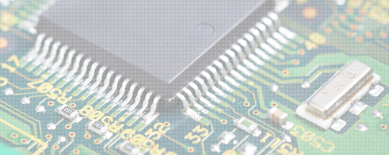 A close up of a chip on a circuit board.